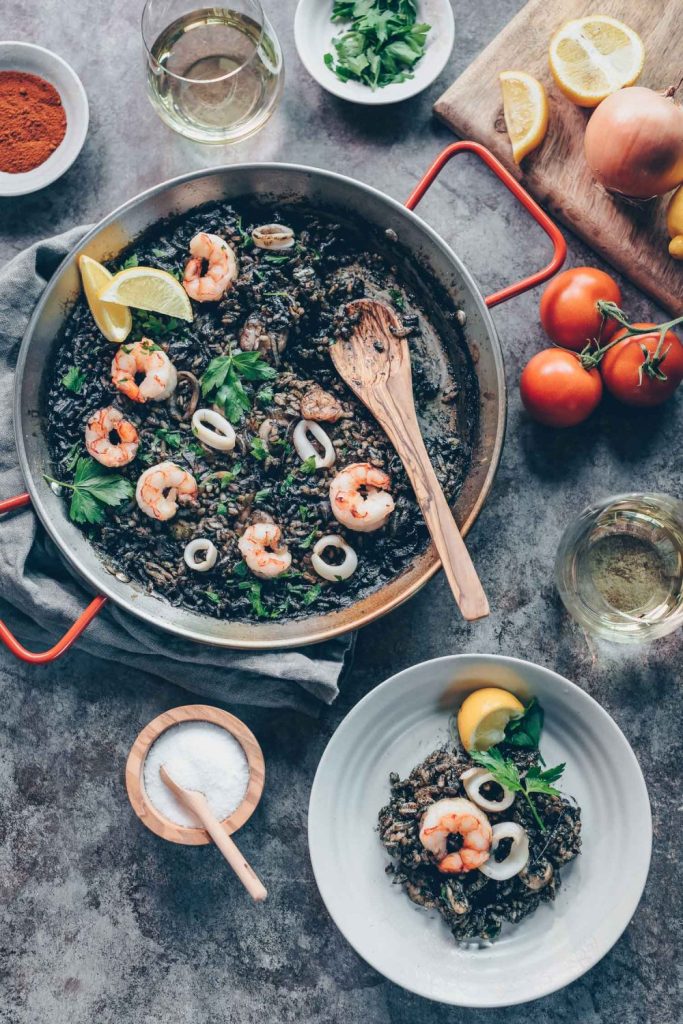 Mastering the Art of Paella Negra: A Comprehensive Guide to Crafting Squid Ink Seafood Paella