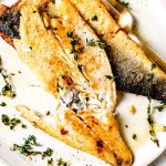 Symphony of the Sea: Unlocking the Magic of Sea Bass with Garlic Butter