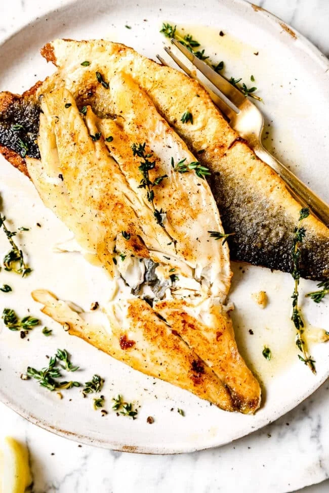 Symphony of the Sea: Unlocking the Magic of Sea Bass with Garlic Butter
